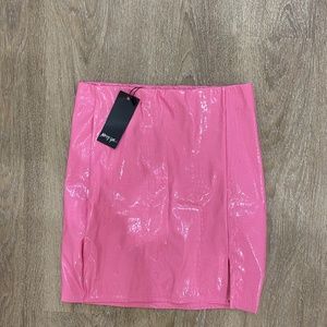 Pink patent mini skirt